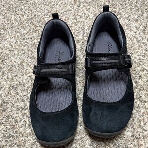 Clarks Suede flats with Velcro strap.